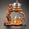 Einzigartiges kunstvolles automatisches Teeservice aus Glas - elegantes Design einer weiblichen Figur